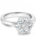 A floral Carver Studio white gold engagement ring with 7 diamonds.
